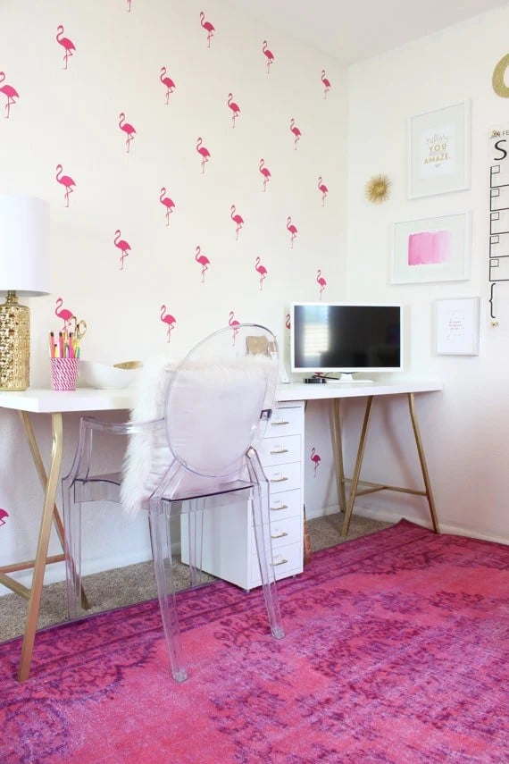 image of pink flamingos cut out of wallpaper on wall