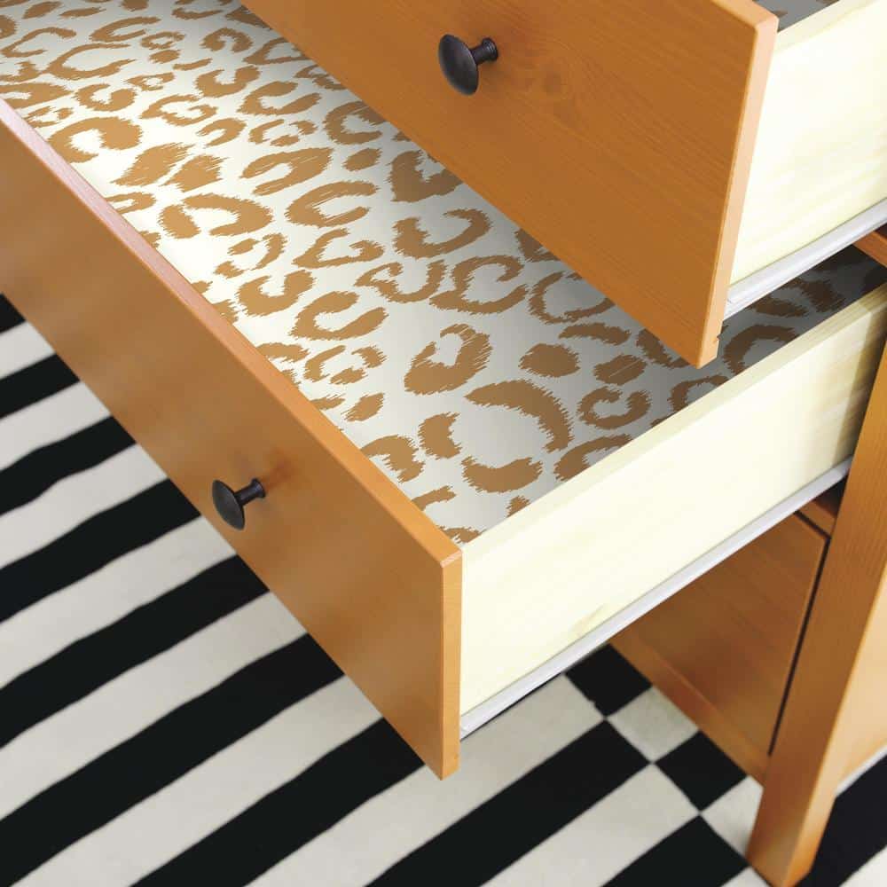 drawers lined with printed wallpaper