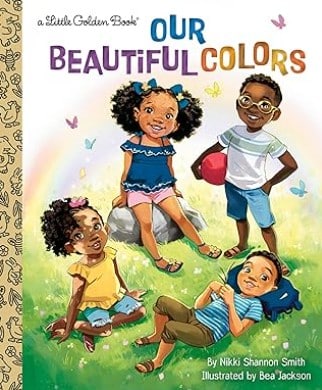 Four children on green grass with butterflies around them and one child is holding a red ball.