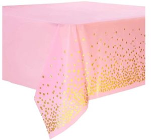 Light pink tablecloth with gold specks.